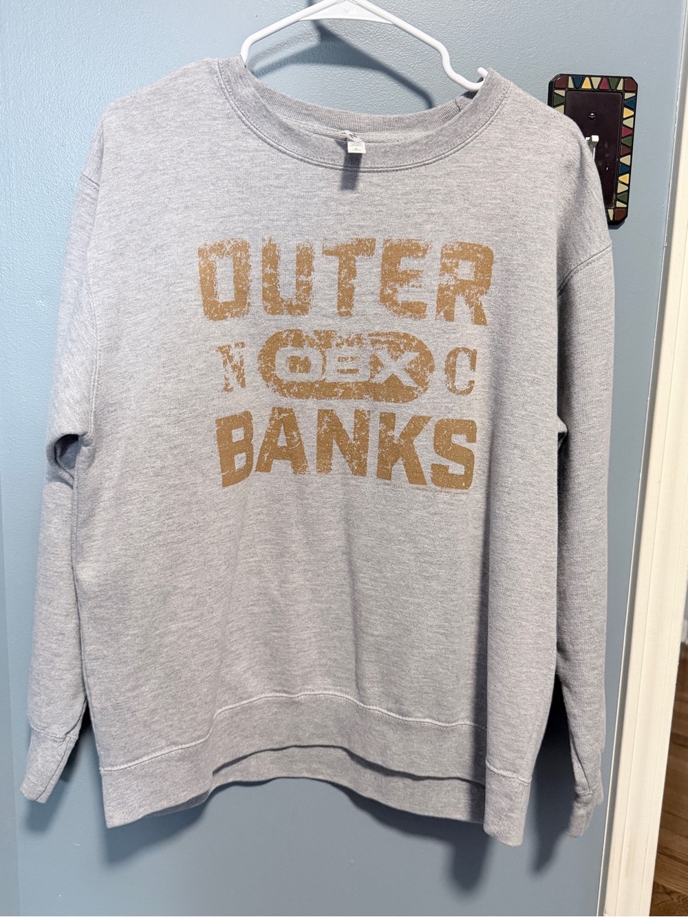 Netflix Gray Sweatshirt with Distressed Tan 'Outer Banks' Graphic